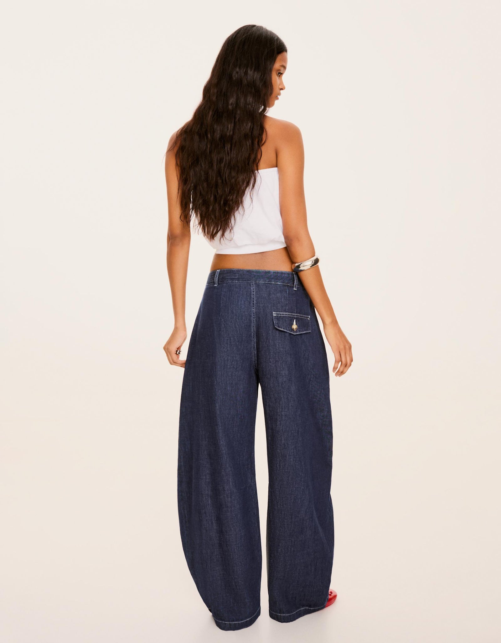 Low-Rise Twisted Jeans